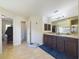 Bright bathroom features double vanities, soaking tub, and separate shower with tile floors at 1155 Towergate Cir, Lake Wales, FL 33853