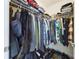 Organized walk-in closet with shelving and hanging space for storage at 1155 Towergate Cir, Lake Wales, FL 33853
