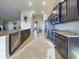 Features stainless steel appliances, tile flooring, granite countertops, and dark wood cabinets at 1155 Towergate Cir, Lake Wales, FL 33853