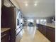 Spacious kitchen with stainless steel appliances, granite counters, and an open layout at 1155 Towergate Cir, Lake Wales, FL 33853