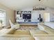 Stylish living room with a modern entertainment center and comfortable seating at 1155 Towergate Cir, Lake Wales, FL 33853