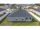 Aerial view of house and neighborhood at 1225 Third Ct, Eagle Lake, FL 33839