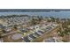 Aerial view showing home's location near a lake in a residential neighborhood at 1225 Third Ct, Eagle Lake, FL 33839