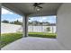 Covered patio with ceiling fan overlooking backyard at 1225 Third Ct, Eagle Lake, FL 33839