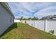 Landscaped backyard with privacy fence at 1225 Third Ct, Eagle Lake, FL 33839