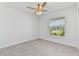 Bright bedroom with ceiling fan and window blinds at 1225 Third Ct, Eagle Lake, FL 33839