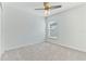 Bright bedroom with ceiling fan and window at 1225 Third Ct, Eagle Lake, FL 33839