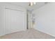 Well-lit bedroom with double door closet at 1225 Third Ct, Eagle Lake, FL 33839