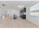 Open concept kitchen with island and dark cabinetry at 1225 Third Ct, Eagle Lake, FL 33839