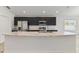 Kitchen island with granite countertop and modern sink at 1225 Third Ct, Eagle Lake, FL 33839