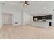 Open concept kitchen with dark cabinetry and stainless steel appliances at 1225 Third Ct, Eagle Lake, FL 33839