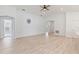 Bright living room features hardwood floors and high ceilings at 1225 Third Ct, Eagle Lake, FL 33839