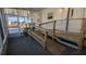 Covered porch with wooden handicap ramp and views at 1610 Reynolds Rd # 211, Lakeland, FL 33801