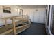 Covered porch with wooden handicap ramp to access the home at 1610 Reynolds Rd # 211, Lakeland, FL 33801