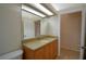 Bathroom featuring a large mirror and a blue patterned shower curtain over the bath at 3226 Oak Tree Ln, Winter Haven, FL 33884