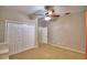 Bedroom featuring a closet and a ceiling fan for optimal air flow at 3226 Oak Tree Ln, Winter Haven, FL 33884
