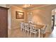 Formal dining area with table, chairs, chandelier and tile floors at 3226 Oak Tree Ln, Winter Haven, FL 33884