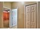 Hallway displaying multiple rooms and a double door closet for optimal storage at 3226 Oak Tree Ln, Winter Haven, FL 33884