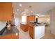 Spacious kitchen area with a large island, stainless steel appliances and open floor plan at 3226 Oak Tree Ln, Winter Haven, FL 33884