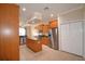 Modern kitchen with stainless steel appliances, island, and wood cabinetry at 3226 Oak Tree Ln, Winter Haven, FL 33884