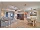 Open floor plan showcasing the living room, dining room, and wood entertainment center at 3226 Oak Tree Ln, Winter Haven, FL 33884