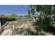 Backyard featuring an above ground pool and a storage shed at 3709 Feather Dr, Lakeland, FL 33812