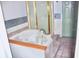 Spa-like bathroom with a large jacuzzi tub and shower at 3709 Feather Dr, Lakeland, FL 33812