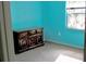 Bedroom featuring teal walls, wood dresser and carpet at 3709 Feather Dr, Lakeland, FL 33812