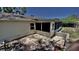 Exterior of house featuring a screened in room and back patio at 3709 Feather Dr, Lakeland, FL 33812
