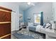 Charming bedroom with nautical accents, blue walls, and unique decor at 4617 S Devon Ave, Lakeland, FL 33813