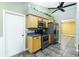 Compact kitchen features stainless appliances and ample cabinet space at 4617 S Devon Ave, Lakeland, FL 33813