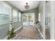 Bright sunroom with natural light ideal as a home office at 4617 S Devon Ave, Lakeland, FL 33813