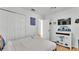 bedroom features a Star Wars theme, a white bed, and nice closet space at 531 Las Fuentes Dr, Kissimmee, FL 34746
