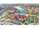 Aerial view of community pool, clubhouse, and playground at 531 Las Fuentes Dr, Kissimmee, FL 34746