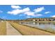 Waterfront community with walking path and homes at 531 Las Fuentes Dr, Kissimmee, FL 34746