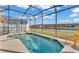 Enjoy the beautiful backyard pool, screened in, with lovely lake views at 531 Las Fuentes Dr, Kissimmee, FL 34746