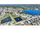 Picturesque aerial view of a lakeside community, complete with ponds and lush greenery at 535 Narrow Pond Rd, Polk City, FL 33868