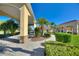 Beautiful view of the community entrance, showcasing the covered parking area and landscaped walkway at 535 Narrow Pond Rd, Polk City, FL 33868