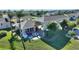 Beautiful home with lush tropical landscaping, outdoor seating and grilling area at 535 Narrow Pond Rd, Polk City, FL 33868
