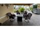 Enjoy the Florida lifestyle on this covered patio with comfortable seating at 535 Narrow Pond Rd, Polk City, FL 33868