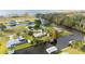 Waterfront homes are nestled along canals, with lush landscaping and private docks providing direct water access at 6029 Avocado Dr, Indian Lake Estates, FL 33855