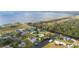 Picturesque waterfront community offering a blend of natural beauty and residential comfort, with easy access to the lake at 6029 Avocado Dr, Indian Lake Estates, FL 33855