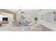 Open living space features comfortable seating arrangements, ceiling fans, and abundant natural light at 6029 Avocado Dr, Indian Lake Estates, FL 33855