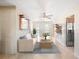 Open-concept living space featuring a brick fireplace and an adjacent kitchen with stainless steel appliances at 6029 Avocado Dr, Indian Lake Estates, FL 33855
