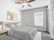 Serene bedroom with soft colors, a ceiling fan, and a closet at 1354 Mezzavalle Way, Auburndale, FL 33823