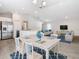 Open dining area adjacent to the kitchen and living room, perfect for entertaining at 1354 Mezzavalle Way, Auburndale, FL 33823