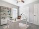 Cozy home office with a modern desk, shelving, and plenty of natural light at 1354 Mezzavalle Way, Auburndale, FL 33823