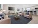 Bright living room with modern furniture, stylish decor, and an open floor plan at 1354 Mezzavalle Way, Auburndale, FL 33823