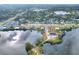 Aerial view showing home's waterfront location at 2116 Sarah Way, Mulberry, FL 33860
