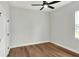 Spacious bedroom with light walls and ceiling fan at 2116 Sarah Way, Mulberry, FL 33860